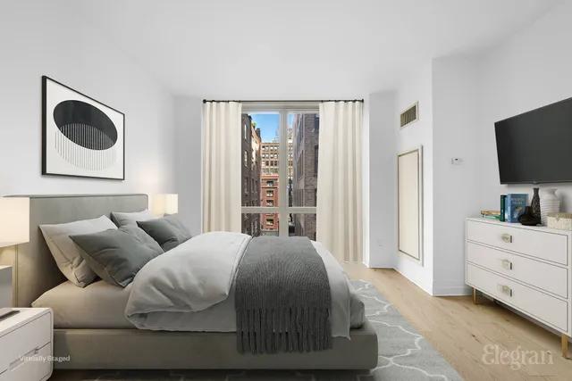 a view of door with wooden floor