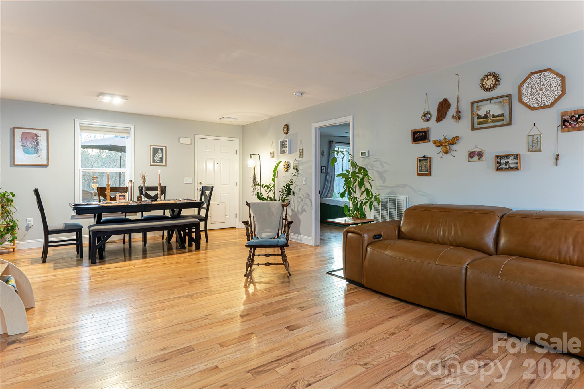 65 Owenby Road Candler, NC 28715 - Photo 20 of 48 a living room with furniture and kitchen view