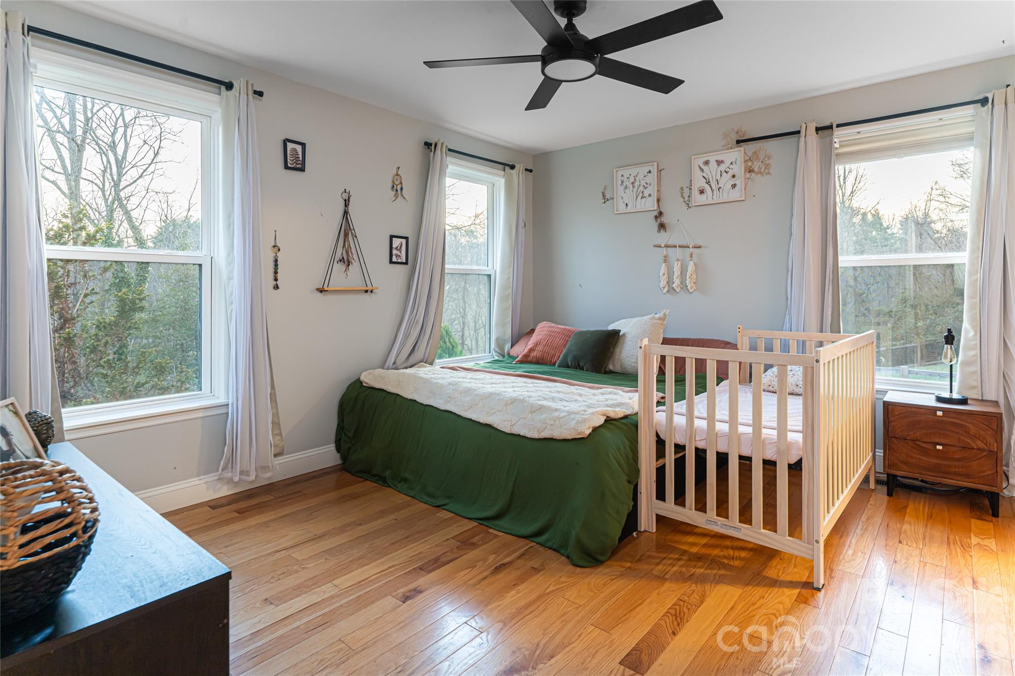 65 Owenby Road Candler, NC 28715 - Photo 26 of 48 a bedroom with a bed and a window