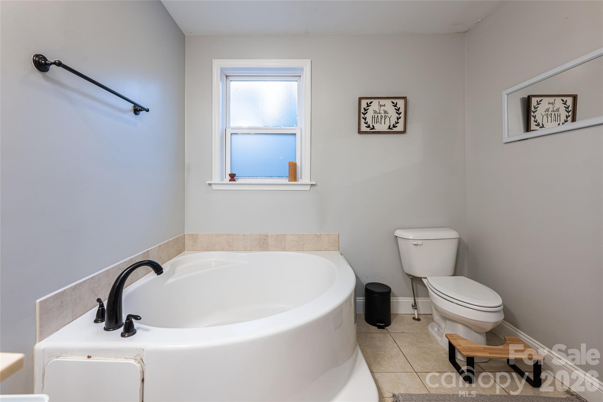 65 Owenby Road Candler, NC 28715 - Photo 28 of 48 a white toilet sitting next to a white sink