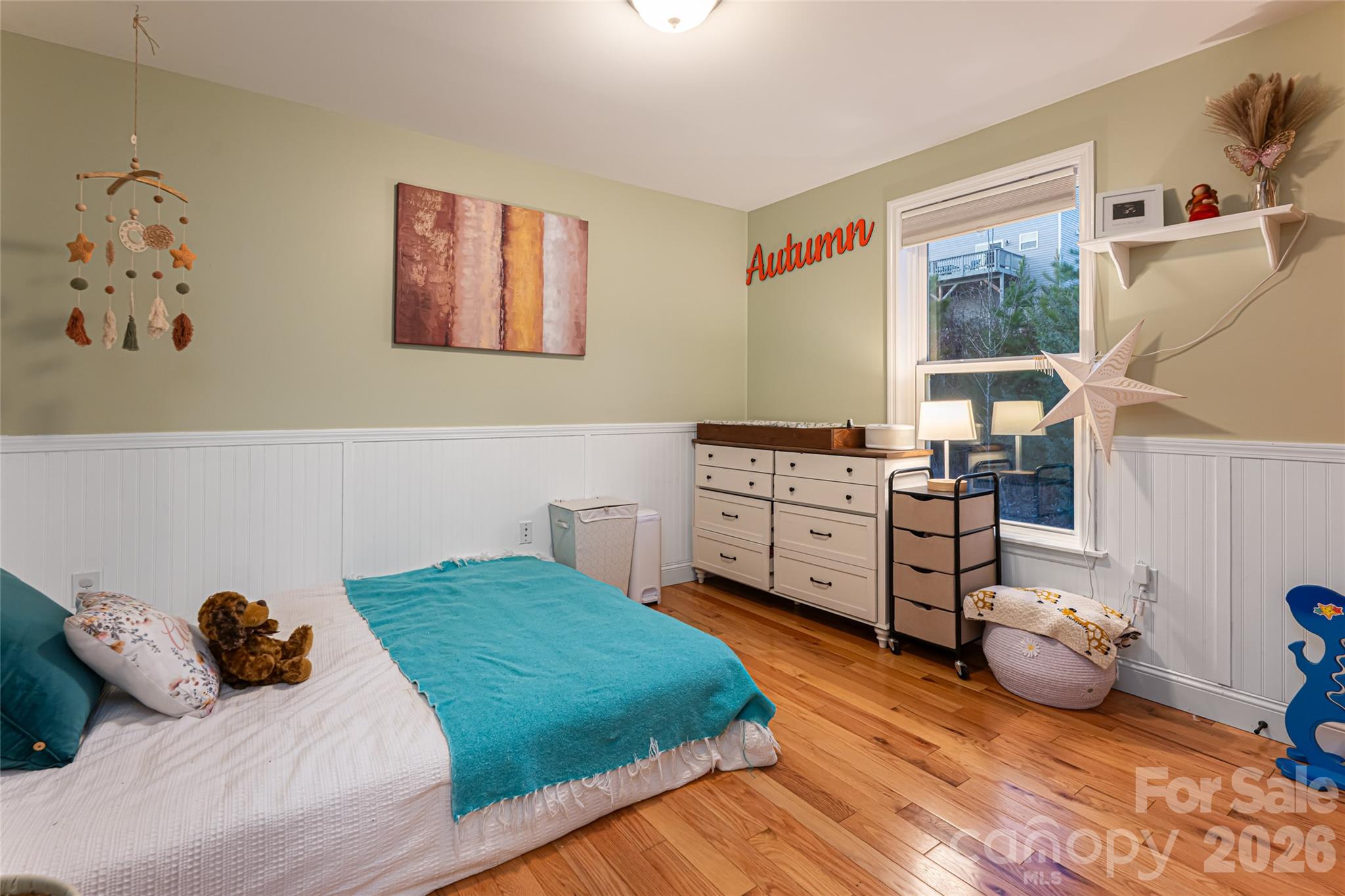 65 Owenby Road Candler, NC 28715 - Photo 30 of 48 a bedroom with a bed and a window