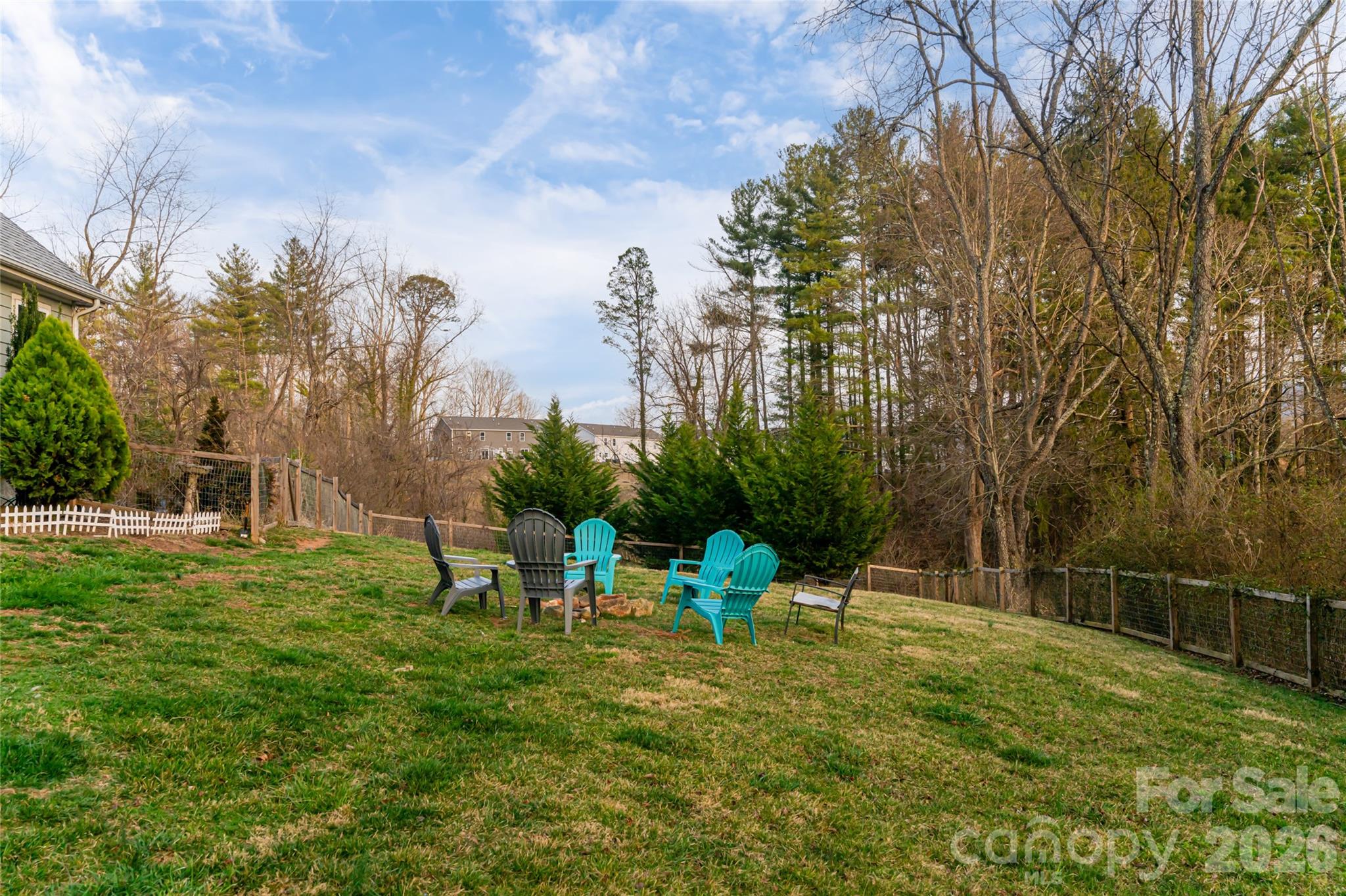 65 Owenby Road Candler, NC 28715 - Photo 37 of 48 a view of a park with large trees