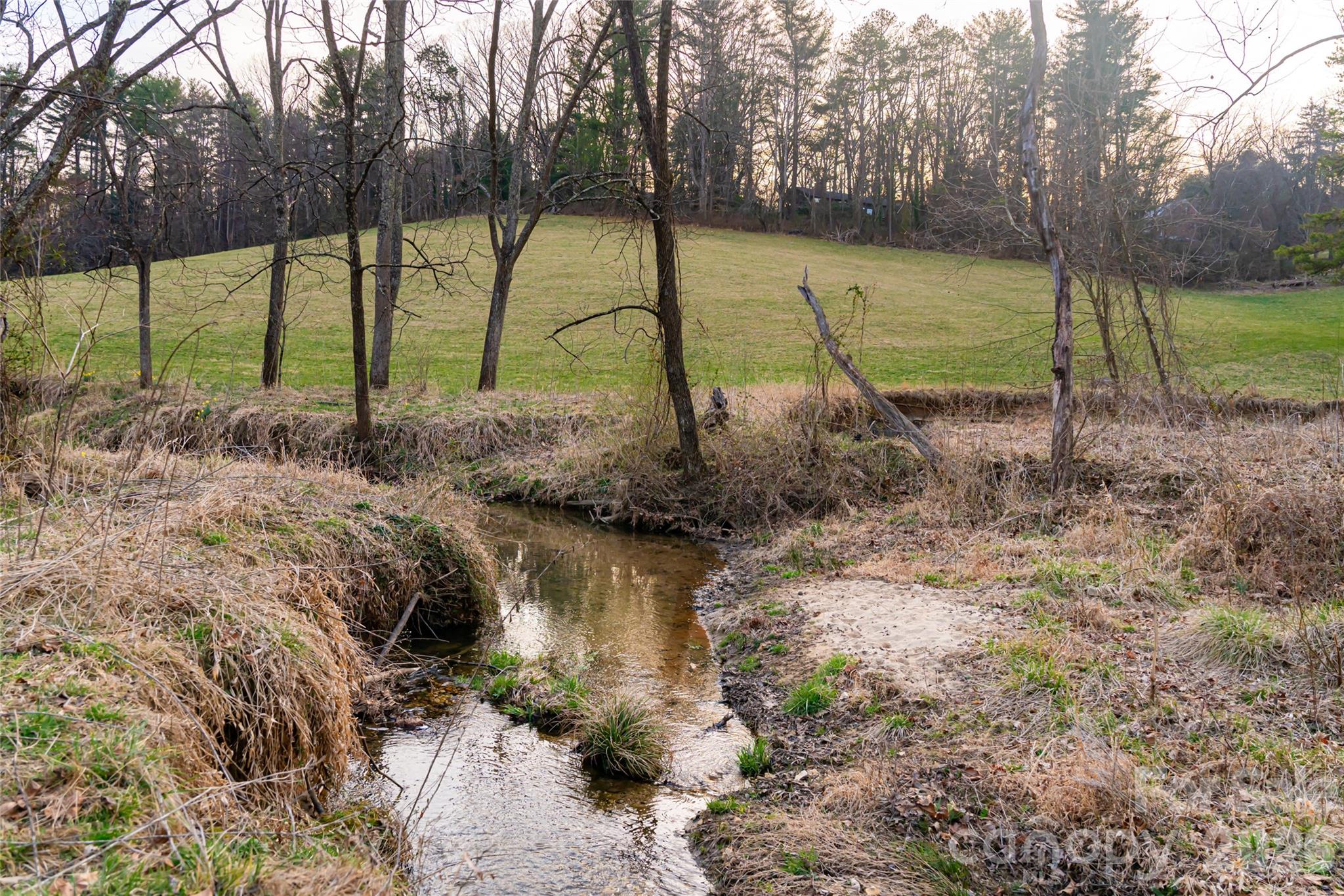 65 Owenby Road Candler, NC 28715 - Photo 42 of 48 a view of a park with a slide