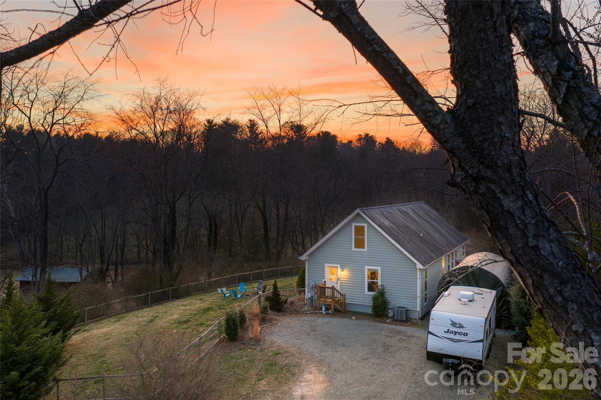 65 Owenby Road Candler, NC 28715 - Photo 44 of 48 a front view of a house with a yard