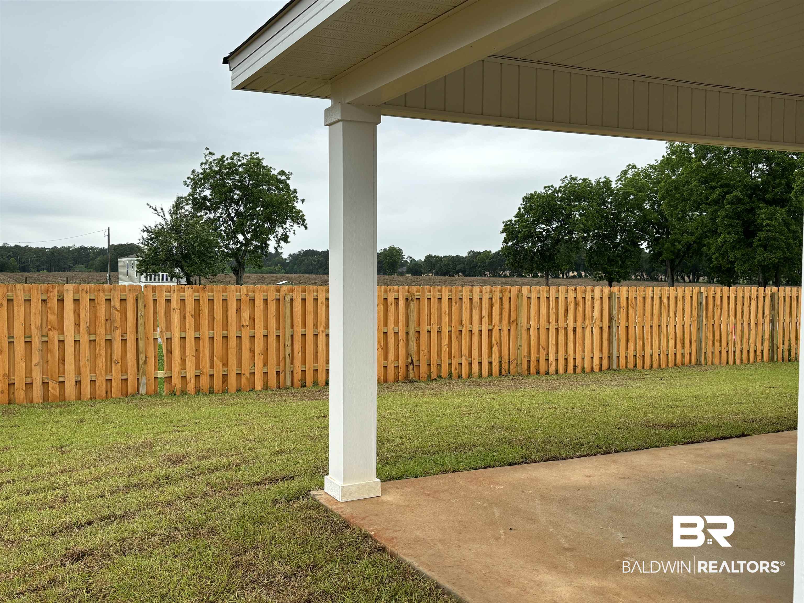24532 Ponder Loop Loxley, AL 36551 - Photo 6 of 44 Looking Out From Back Pat
