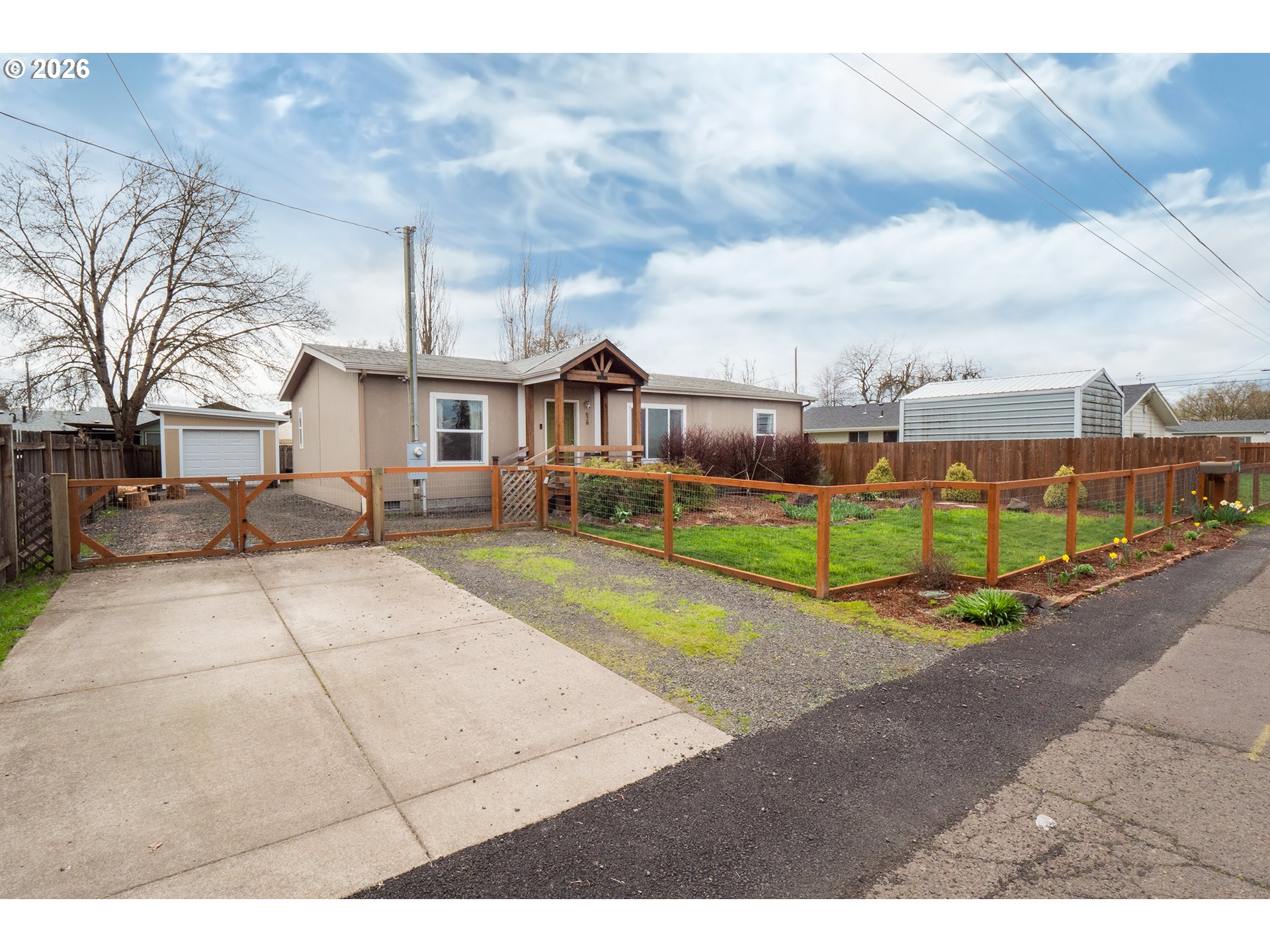 a view of a street with houses