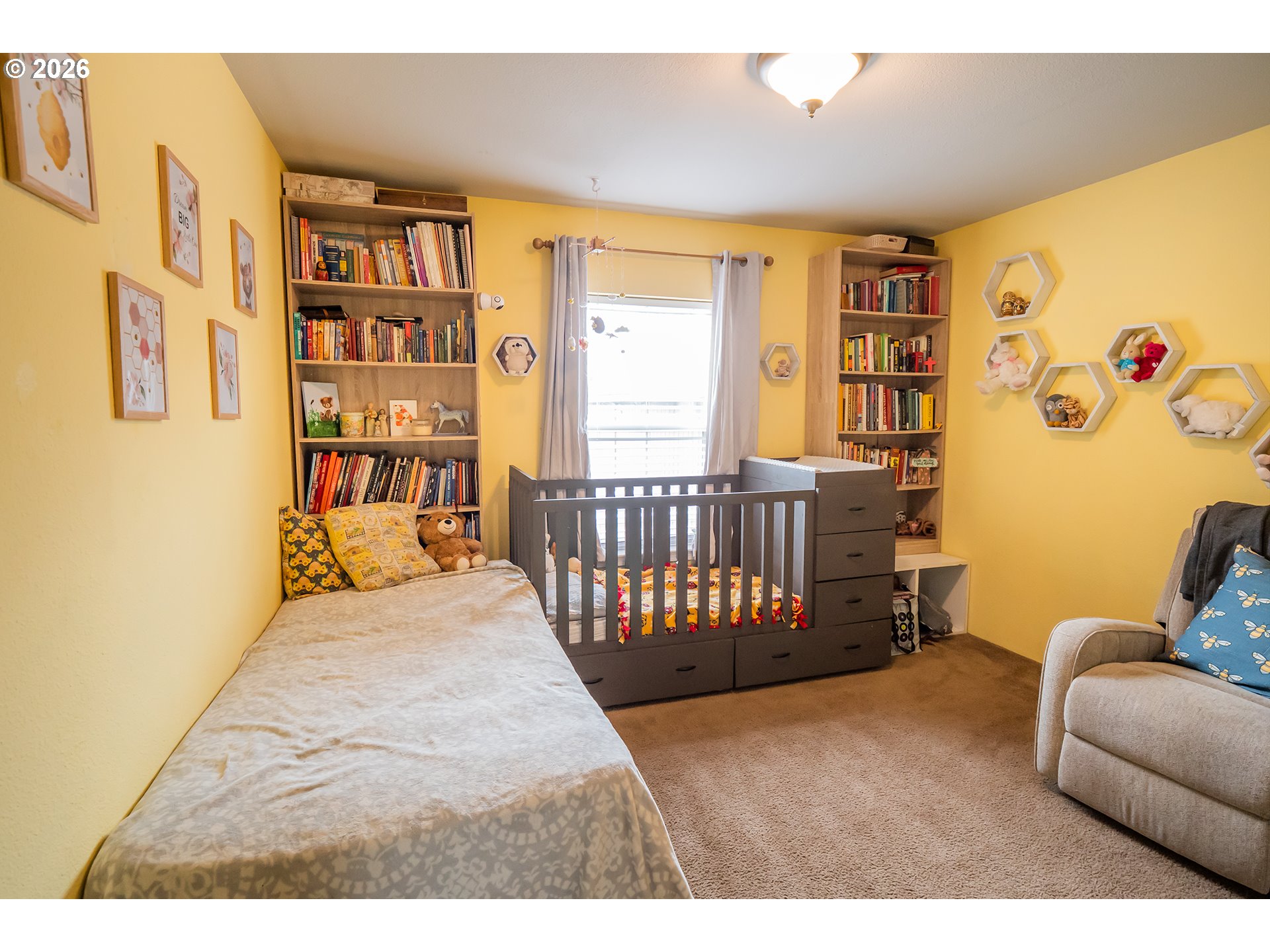 628 Stanley Lane Harrisburg, OR 97446 - Photo 20 of 32 a bedroom with furniture and book shelf
