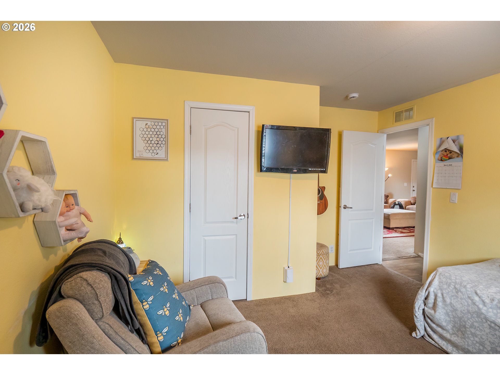 628 Stanley Lane Harrisburg, OR 97446 - Photo 21 of 32 a bedroom with a bed and wooden floor