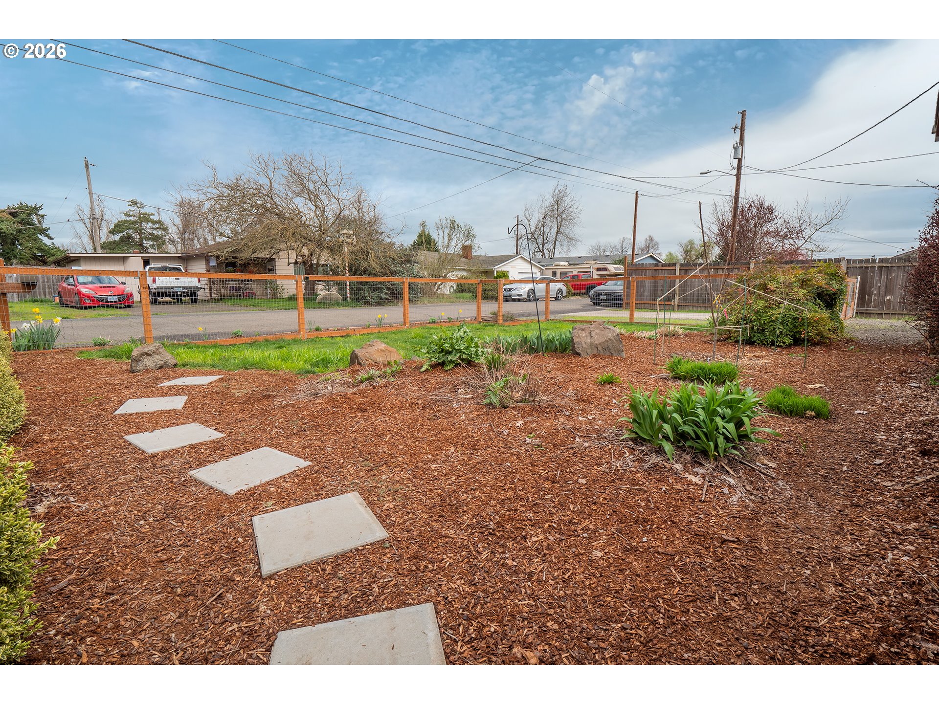 628 Stanley Lane Harrisburg, OR 97446 - Photo 30 of 32 a view of a park with swings and slides