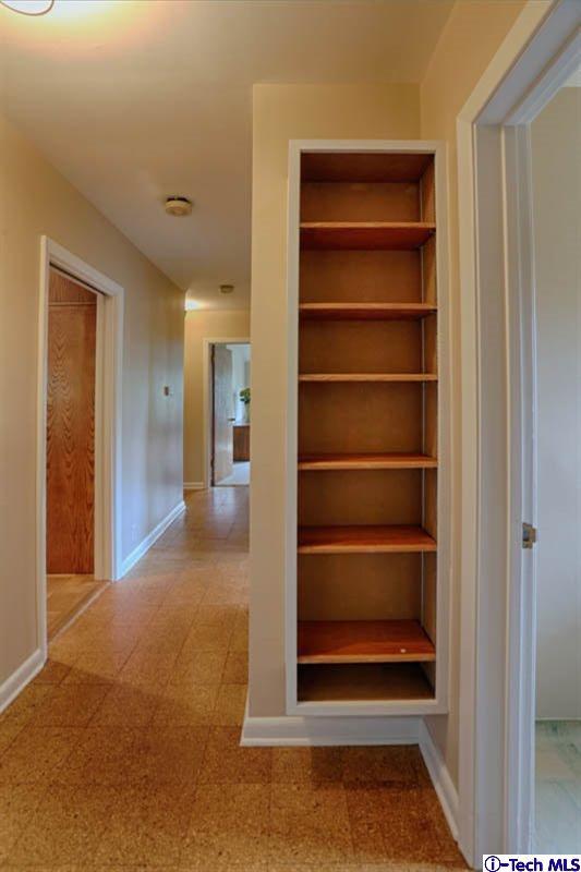 1011 Hillside Terrace Pasadena, CA 91105 - Photo 18 of 32 a view of walk in closet with empty racks