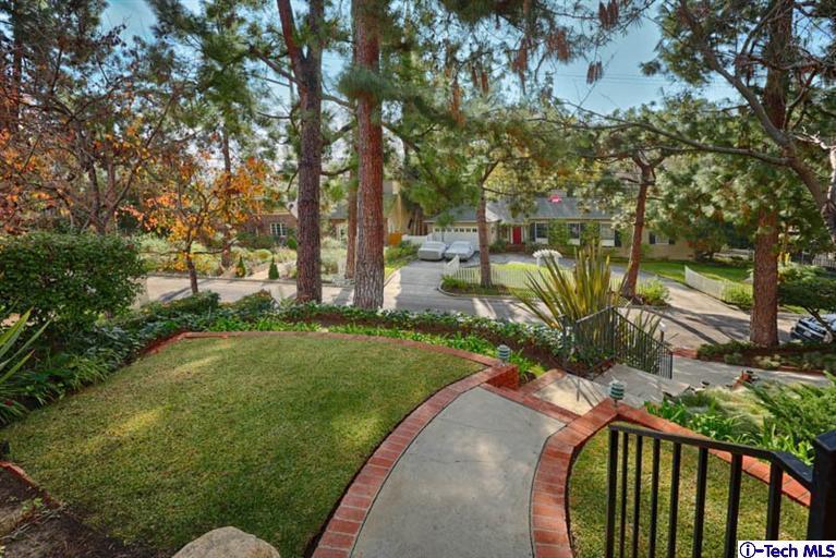 1011 Hillside Terrace Pasadena, CA 91105 - Photo 3 of 32 a view of a street with a tree