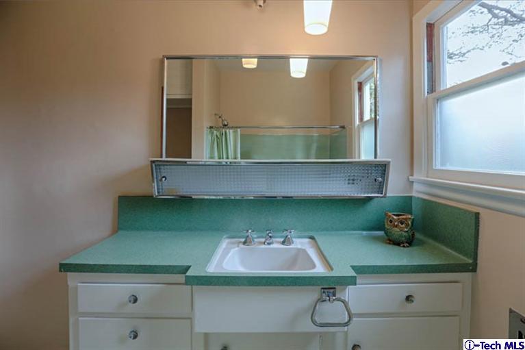 1011 Hillside Terrace Pasadena, CA 91105 - Photo 24 of 32 a kitchen with a sink and cabinets