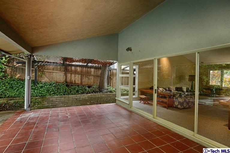 1011 Hillside Terrace Pasadena, CA 91105 - Photo 31 of 32 a view of a house with backyard and porch