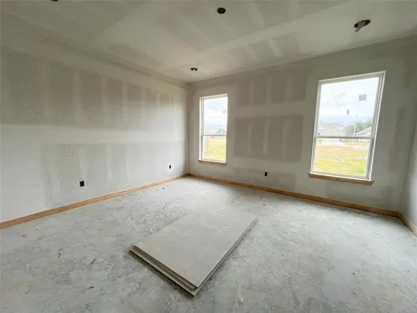 an empty room with windows