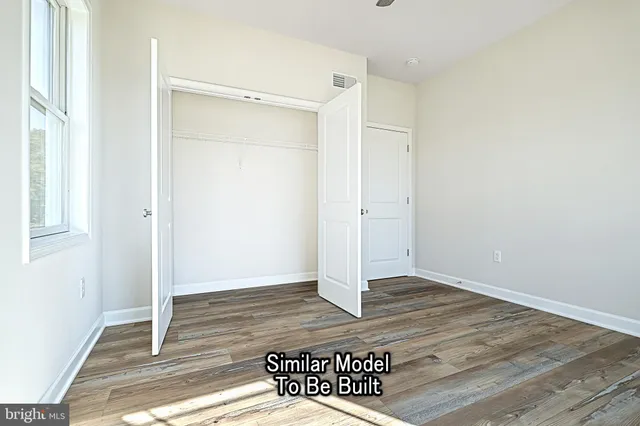 a view of a hallway with closet