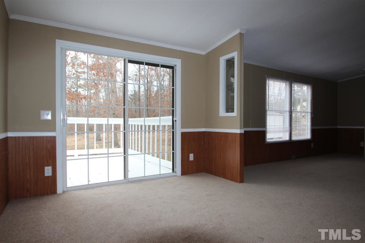 465 Melton Road Roxboro, NC 27574 - Photo 3 of 11 a view of an empty room with a window