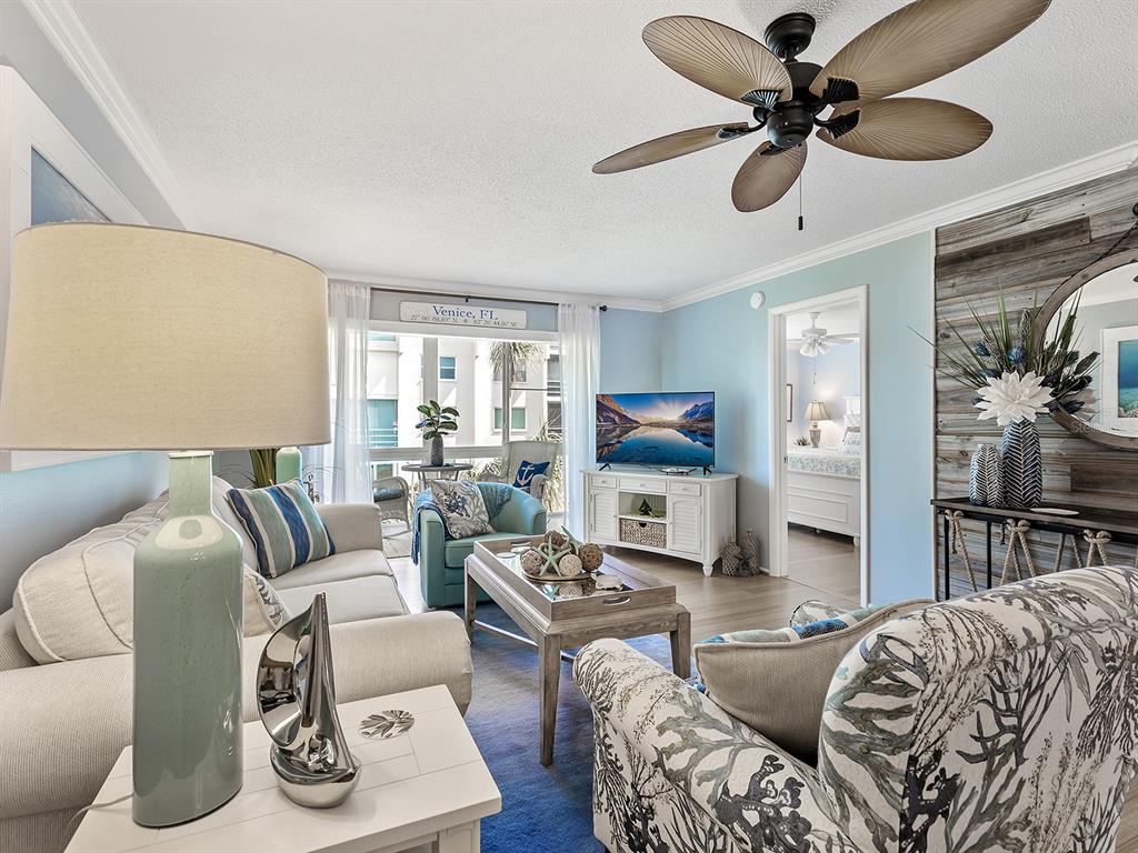 230 Santa Maria Street, Unit 234 Venice, FL 34285 - Photo 15 of 60 a living room with furniture and a window