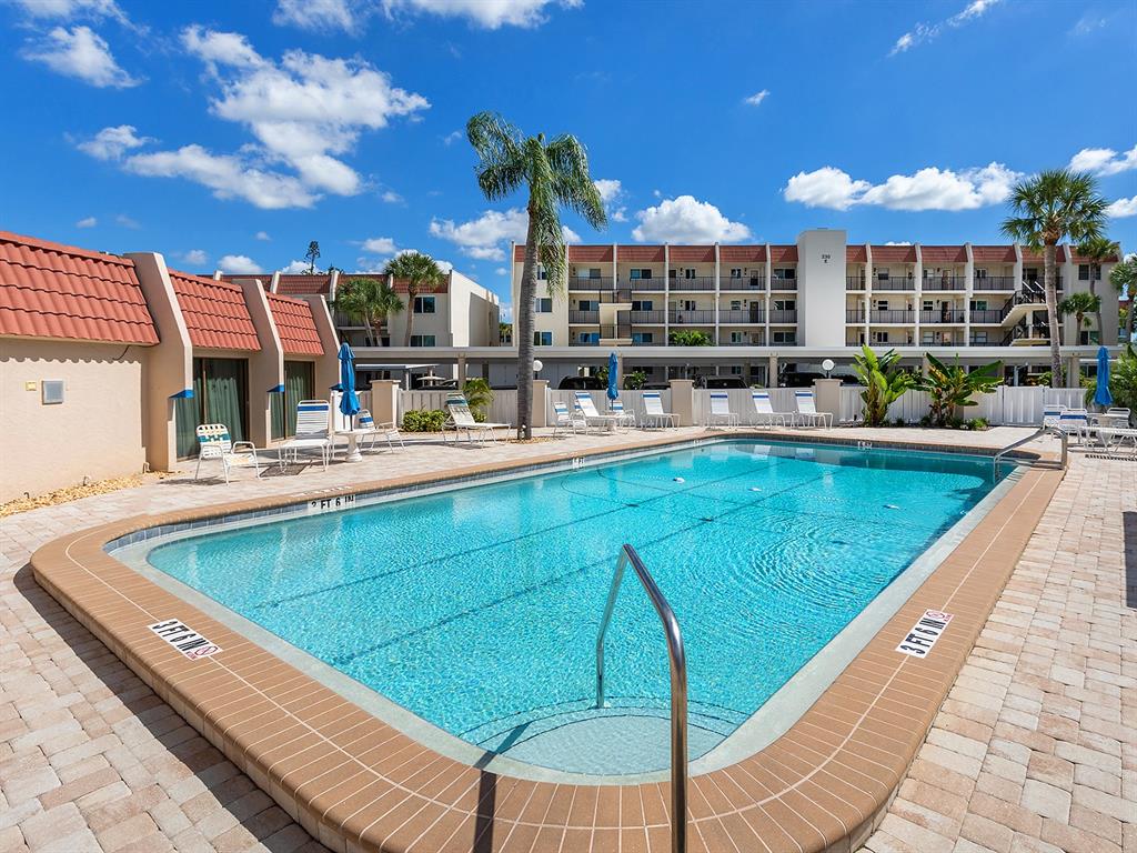 230 Santa Maria Street, Unit 234 Venice, FL 34285 - Photo 45 of 60 a view of a kitchen with a patio
