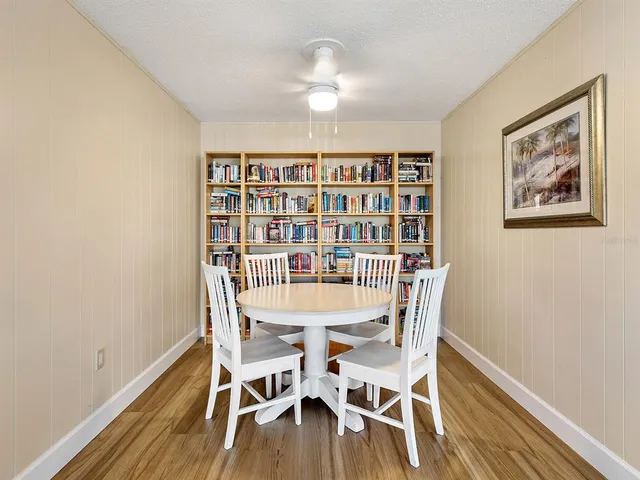 a view of a yard and swimming pool