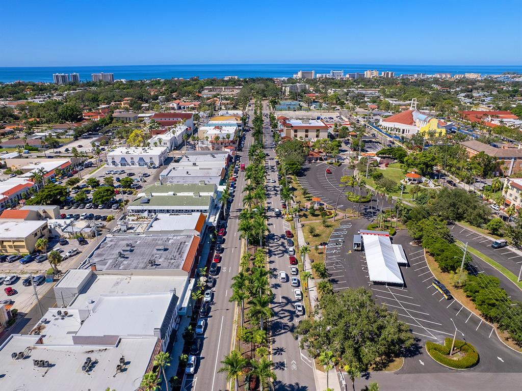 230 Santa Maria Street, Unit 234 Venice, FL 34285 - Photo 55 of 60 an aerial view of residential houses with outdoor space