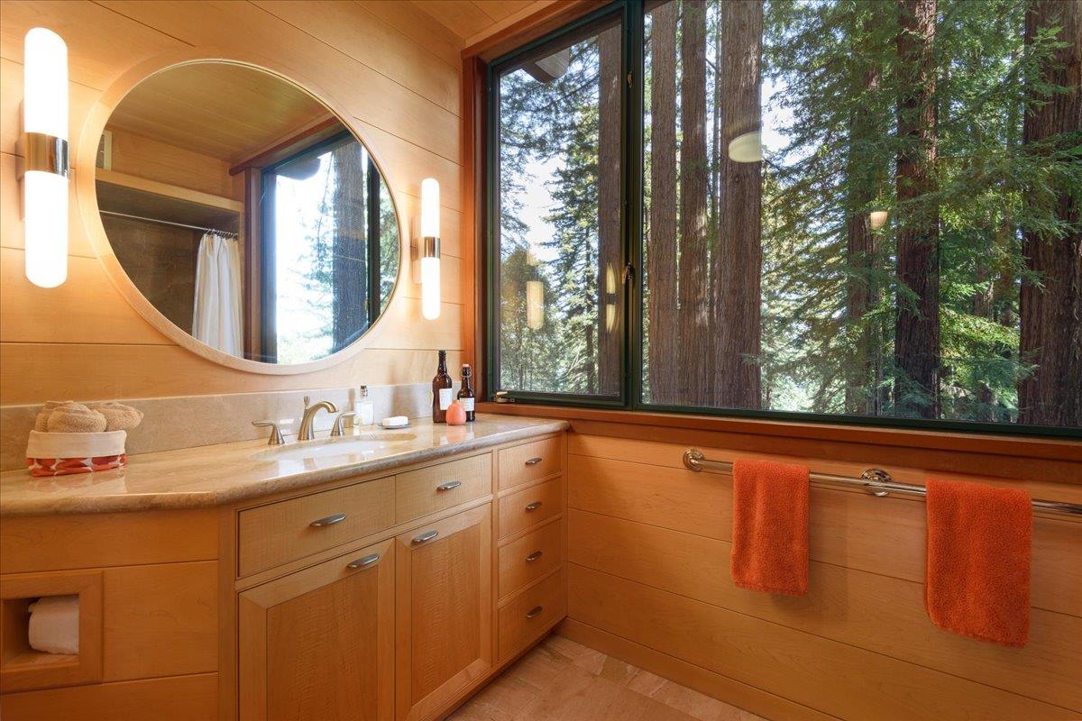 9 Summit Road Woodside, CA 94062 - Photo 21 of 38 a bathroom with a double vanity sink and a mirror