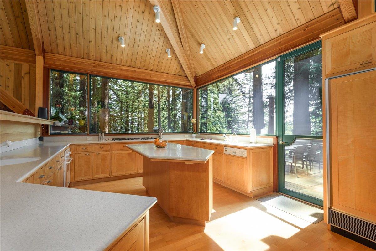 9 Summit Road Woodside, CA 94062 - Photo 8 of 38 a view of a kitchen with a tub and door