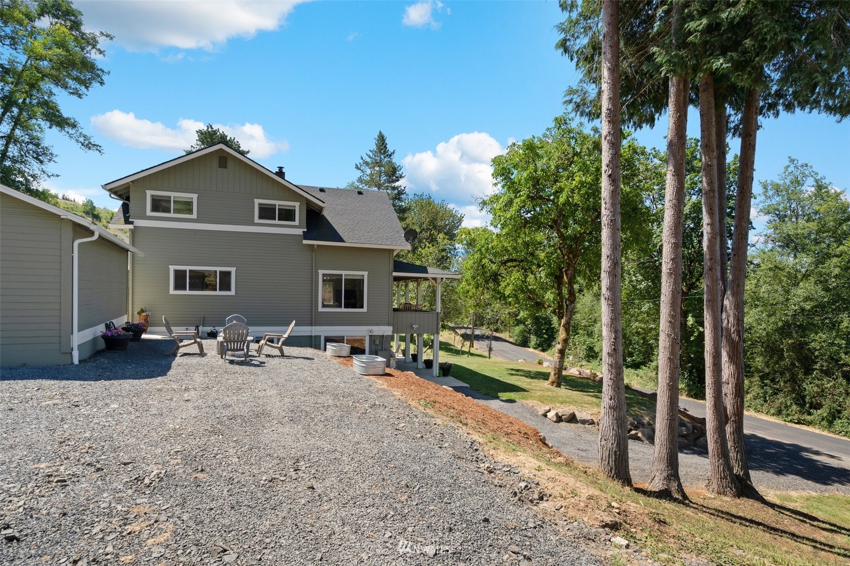 1633 Ferrier Road Winlock, WA 98596 - Photo 39 of 40 a view of a house with backyard and sitting area