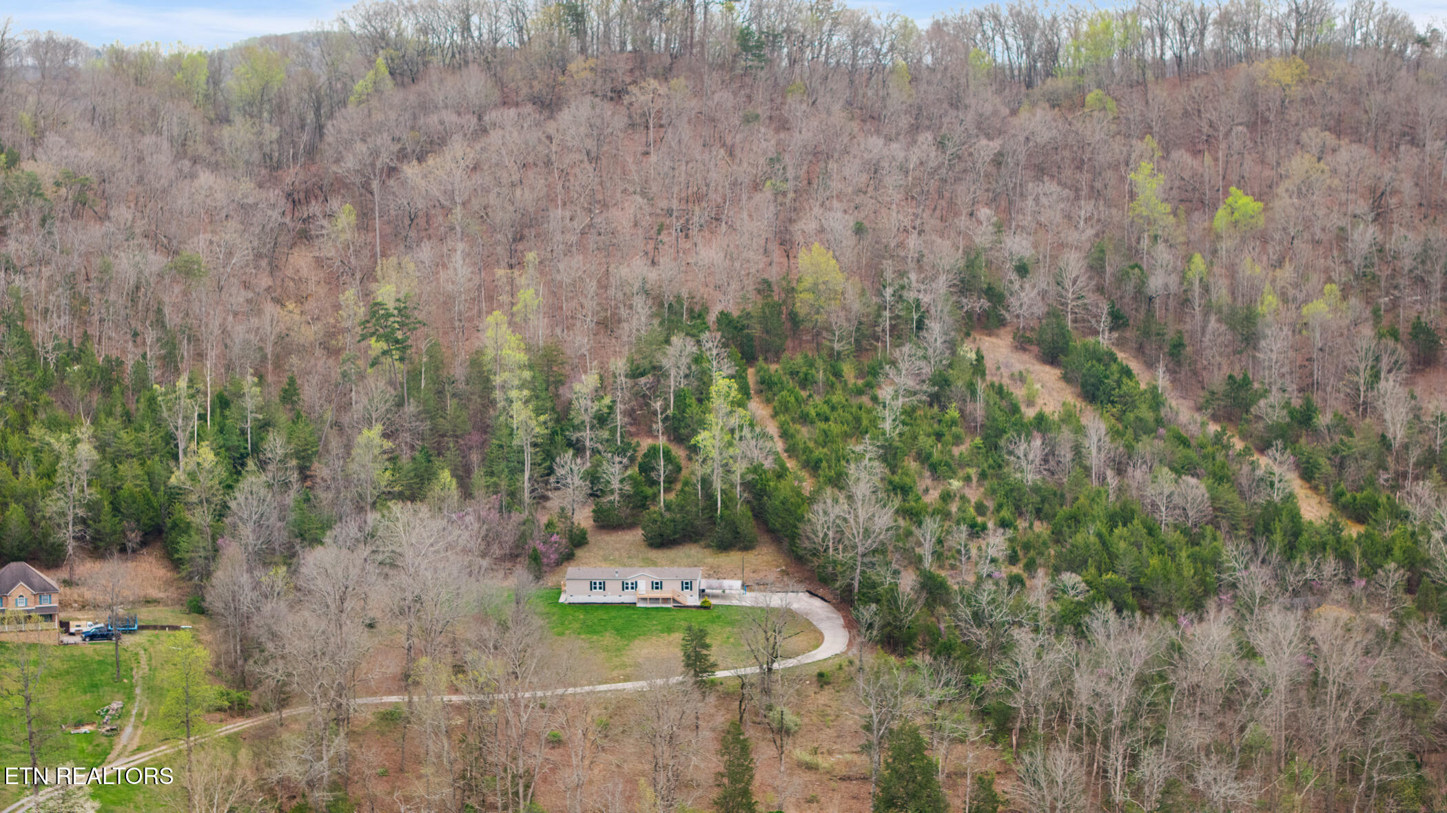 150 East Raccoon Valley Drive Heiskell, TN 37754 - Photo 1 of 36 dji_20260330101833_0612_d