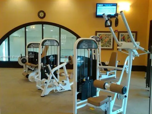 a front view of a house with outdoor seating