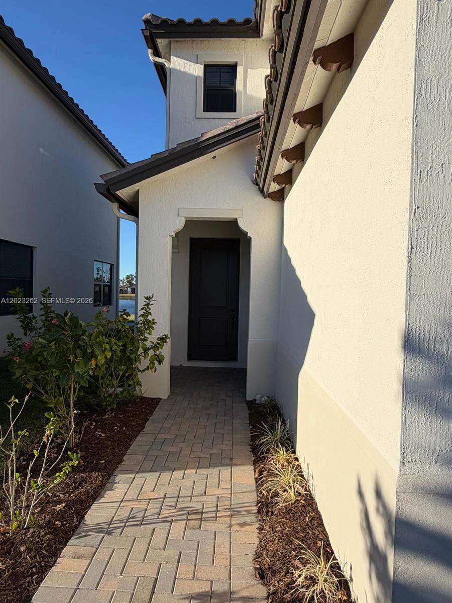 5669 Cerva Lane, Unit 5669 Immokalee, FL 34142 - Photo 2 of 32 a view of entryway with a front door