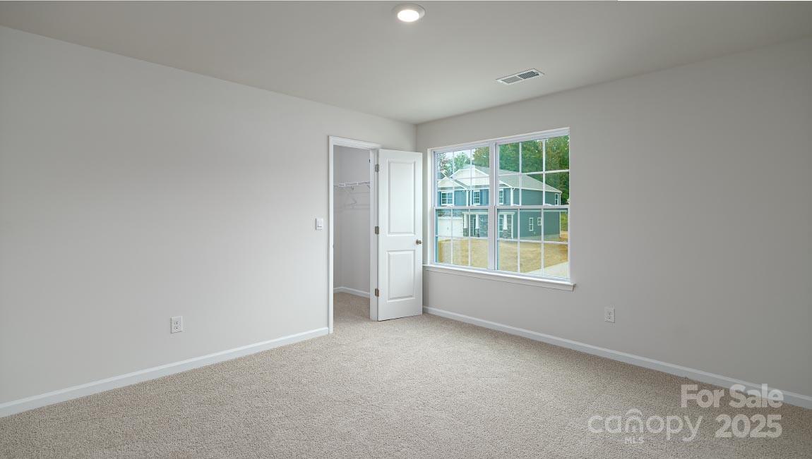 269 Shorthorn Road Fletcher, NC 28732 - Photo 15 of 23 an empty room with a window