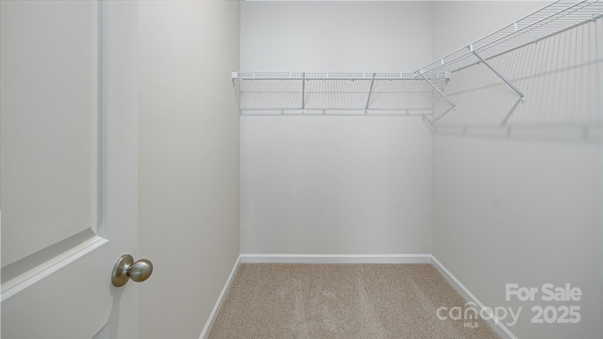269 Shorthorn Road Fletcher, NC 28732 - Photo 20 of 23 a view of a room with racks on the wall