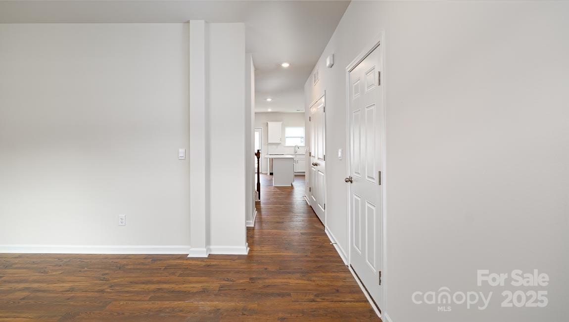 269 Shorthorn Road Fletcher, NC 28732 - Photo 9 of 23 a view of a hallway with wooden floor