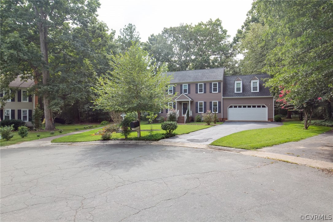 14215 Candlewick Road Midlothian, VA 23112 - Photo 3 of 39 a view of a house with a big yard and large trees