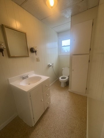 365 Lindsey Street, Unit 2 Fall River, MA 02720 - Photo 4 of 9 a bathroom with a sink toilet and mirror