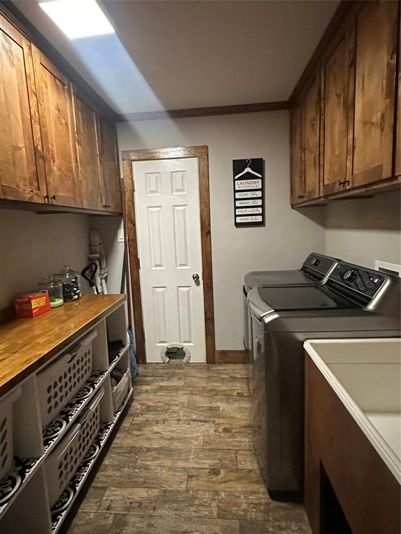 101 Twin Creek Road Comanche, TX 76442 - Photo 28 of 28 a kitchen with stainless steel appliances granite countertop a stove a sink and a refrigerator