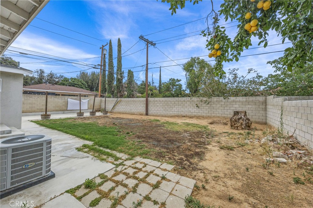 10028 Primrose Drive Riverside, CA 92503 - Photo 18 of 19 a view of a garden with a slide
