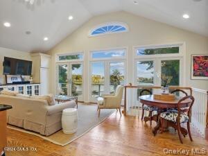 201 Shore Road Greenwich, CT 06830 - Photo 23 of 29 a living room with fireplace furniture and a flat screen tv