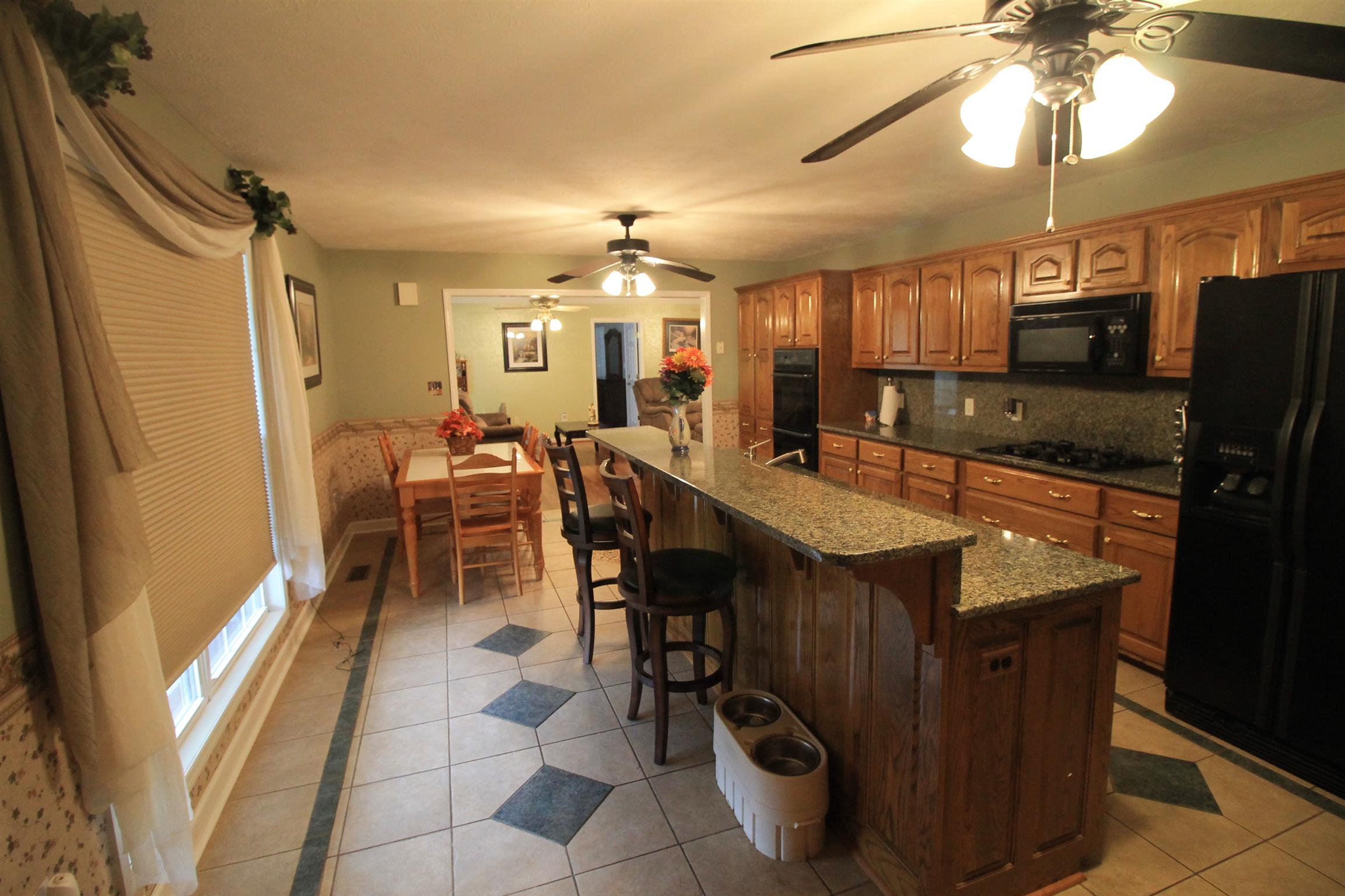 7956 Enterprise Road Mount Pleasant, TN 38474 - Photo 17 of 30 The island sports a breakfast bar.