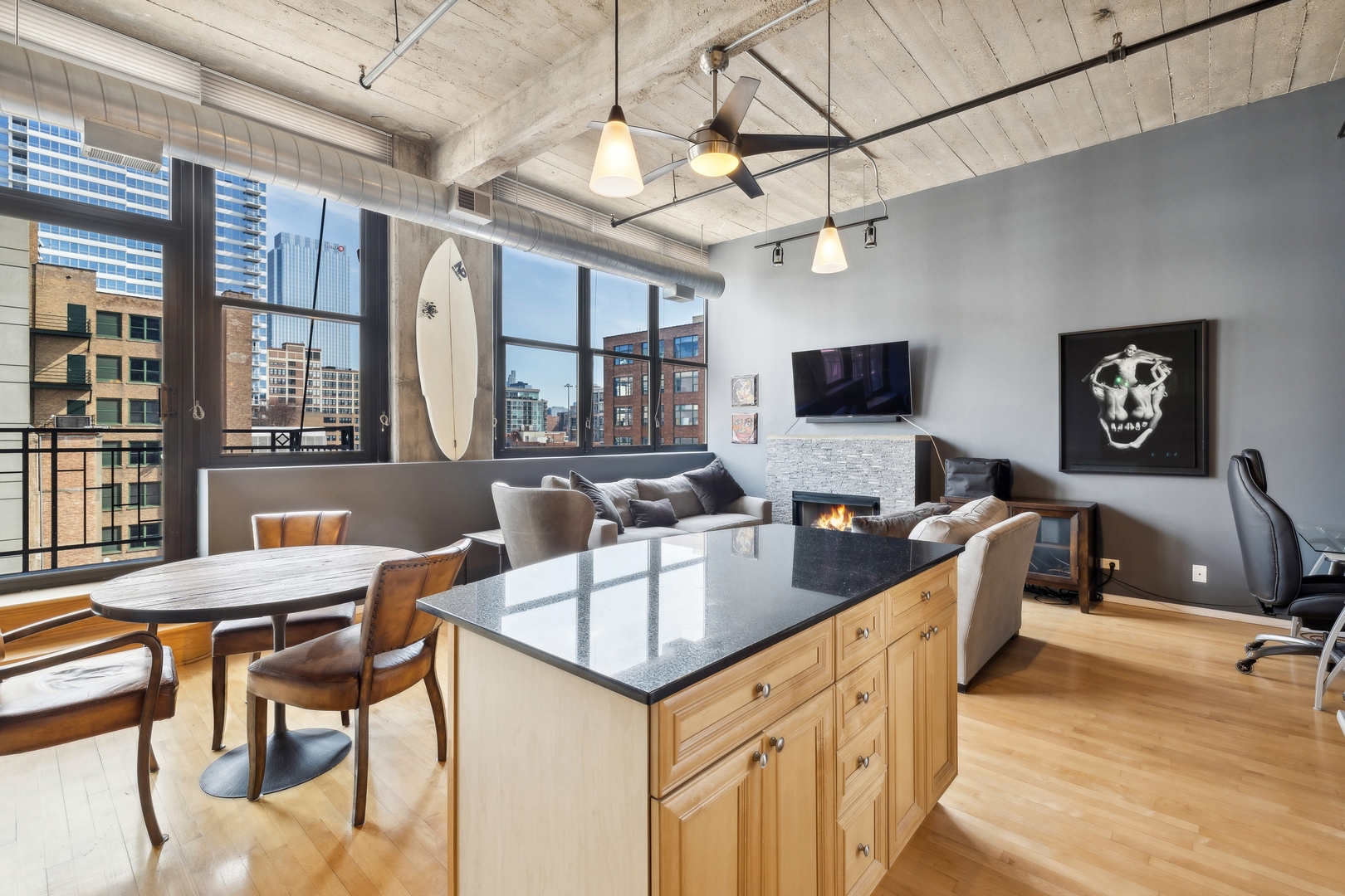 843 West Adams Street, Unit 606 Chicago, IL 60607 - Photo 2 of 12 a view of a dining room with furniture a kitchen and chandelier