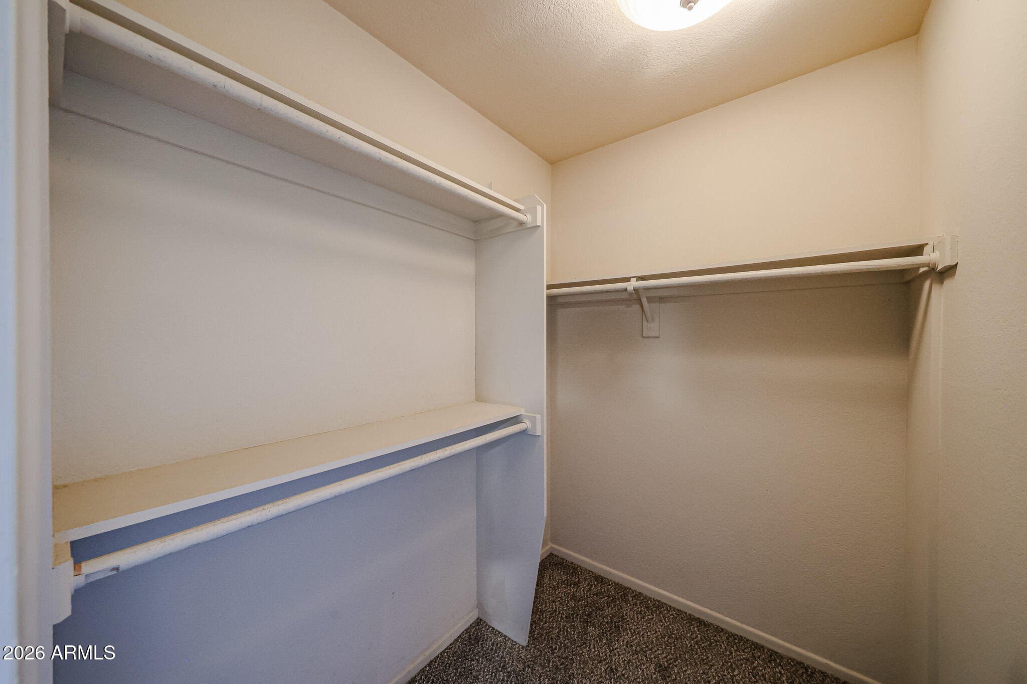 1402 East Guadalupe Road, Unit 216 Tempe, AZ 85283 - Photo 17 of 24 Primary walk in closet