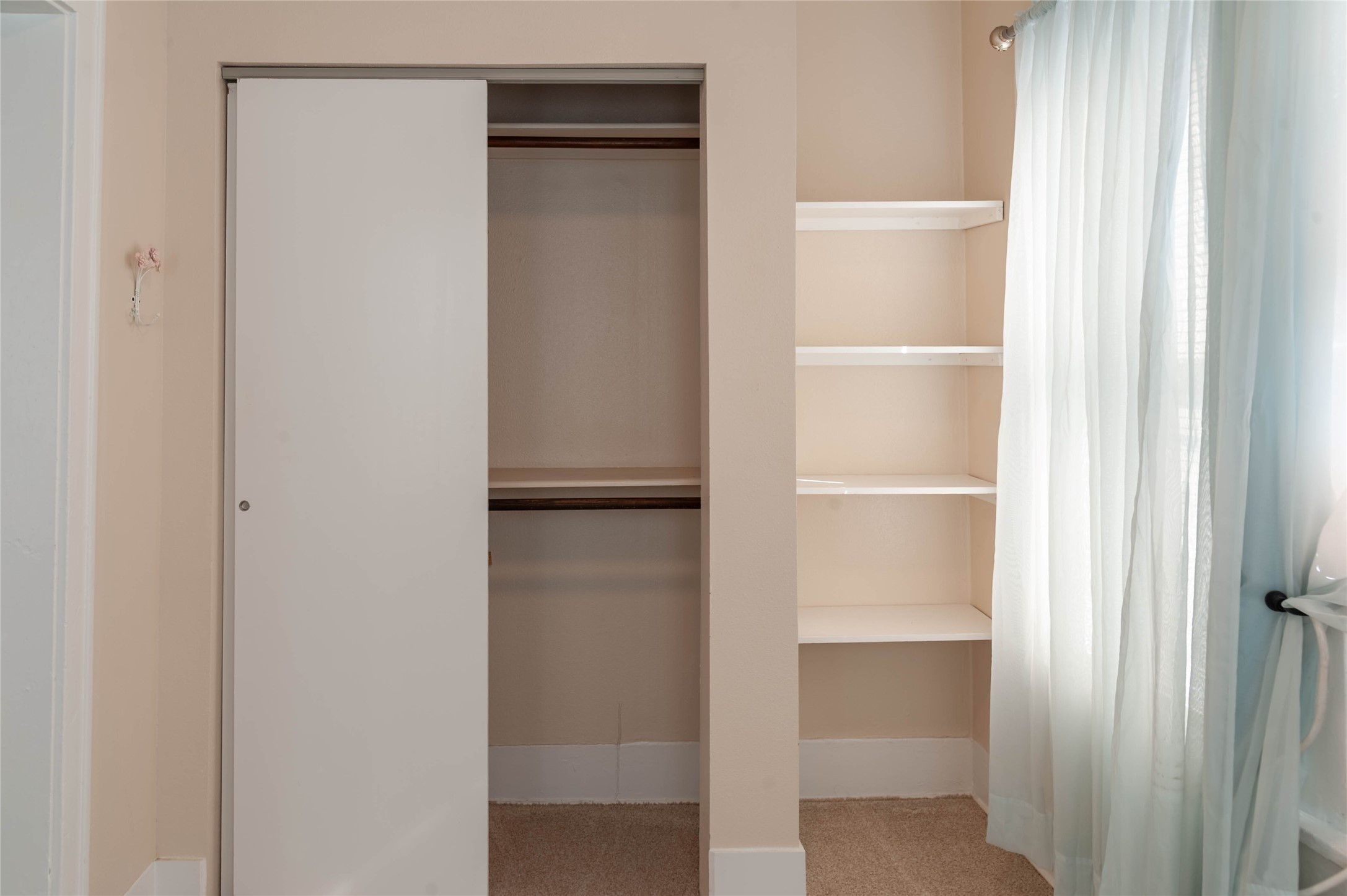 405 West Clay Street, Unit 1 Houston, TX 77019 - Photo 13 of 22 a view of walk in closet with empty racks
