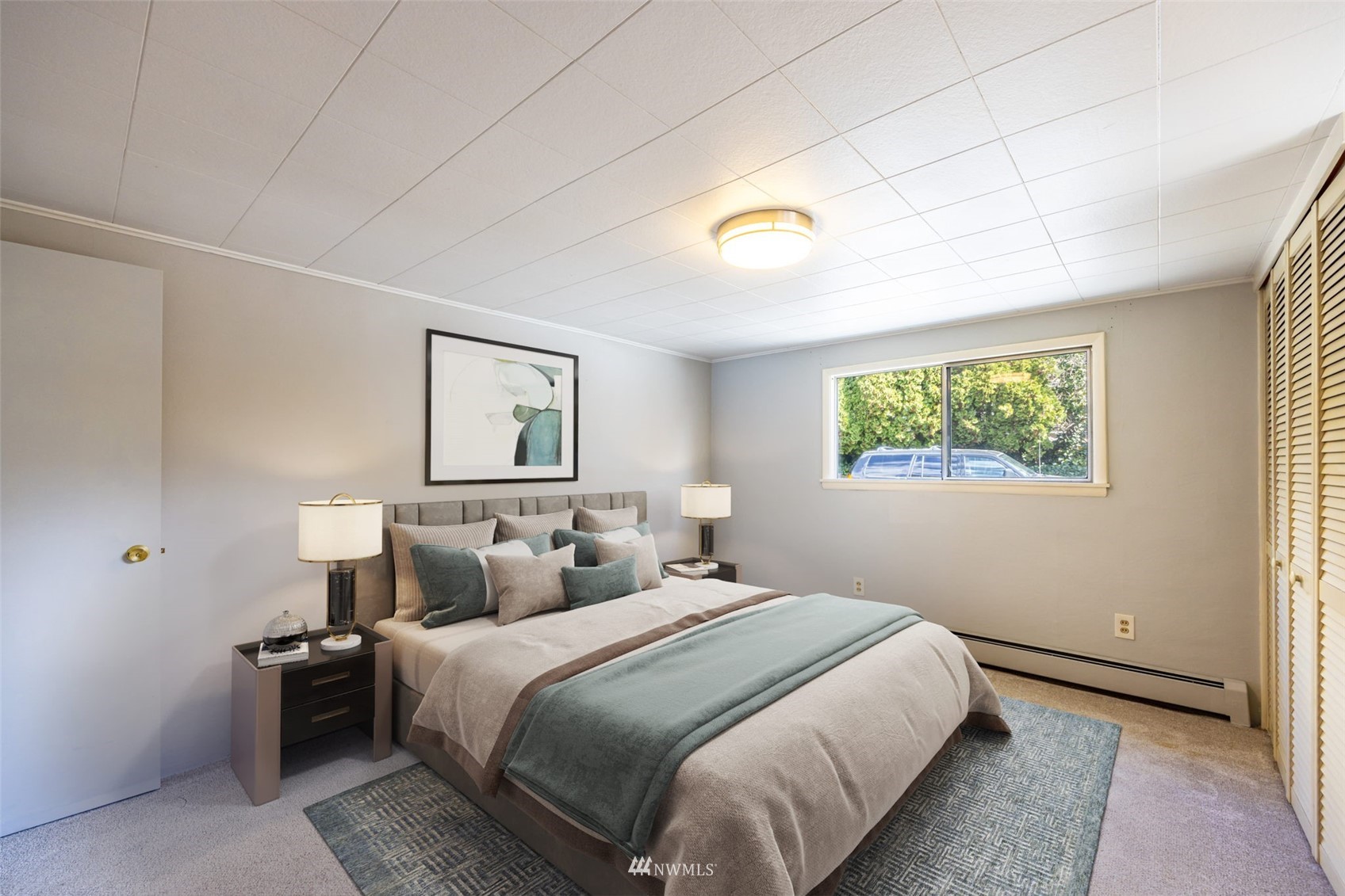 6631 Ripley Ln S East Renton, WA 98056 - Photo 8 of 34 a bedroom with a bed and a window