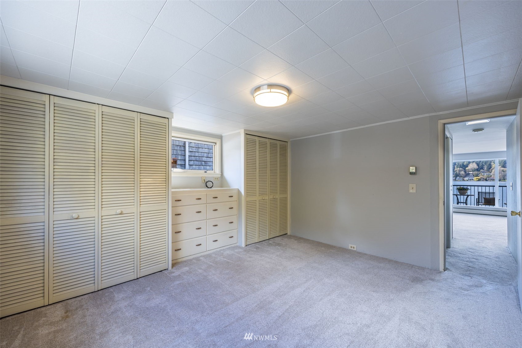 6631 Ripley Ln S East Renton, WA 98056 - Photo 10 of 34 a view of an empty room with closet and cabinet