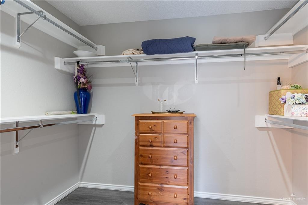 100 West Moore Road, Unit UT39 Pharr, TX 78577 - Photo 13 of 21 Built-in shelving and clothing rods with wood-finish flooring