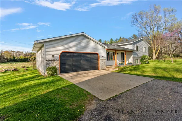 $640,000 | 9095 76th Street Southeast, Alto, MI 49302