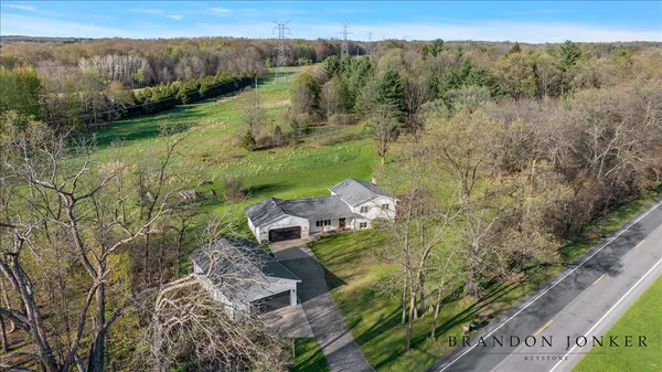 $640,000 | 9095 76th Street Southeast, Alto, MI 49302