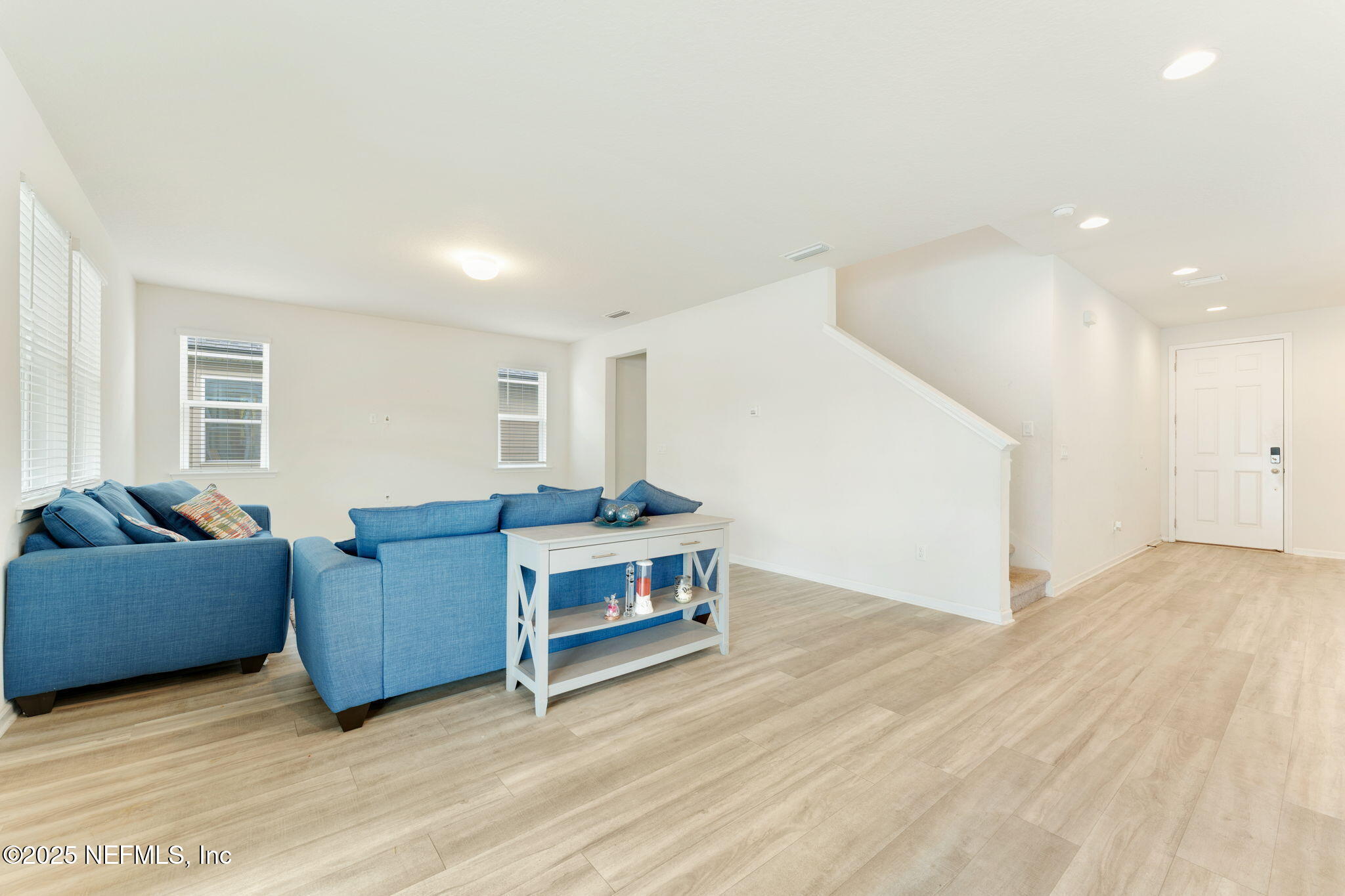 52 Opal Way St. Augustine, FL 32086 - Photo 18 of 55 a living room with furniture and a wooden floor