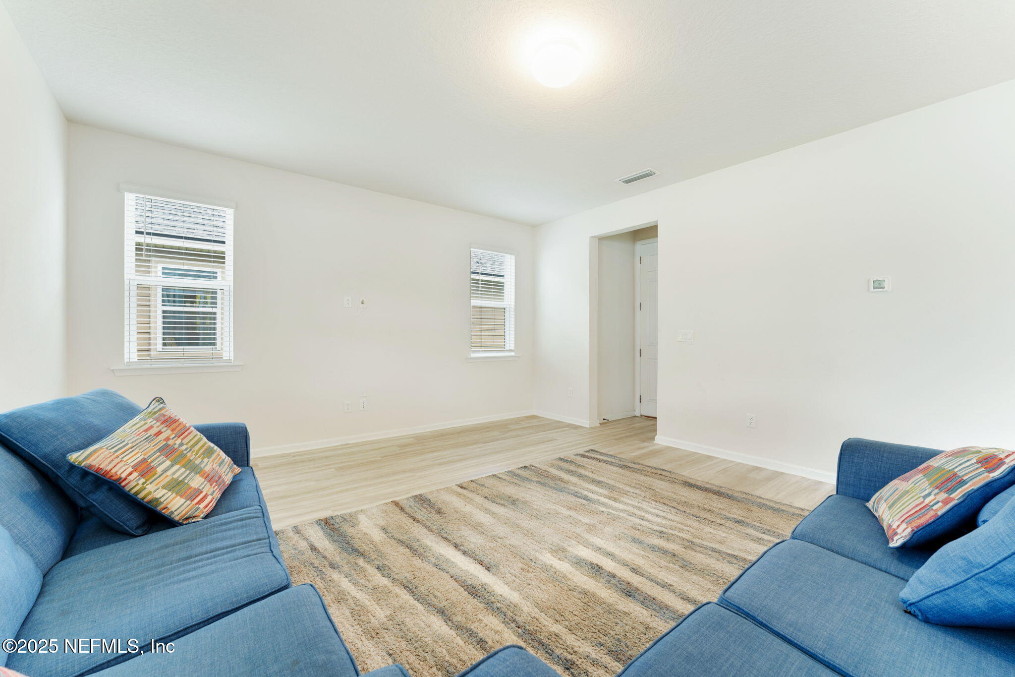 52 Opal Way St. Augustine, FL 32086 - Photo 19 of 55 a bedroom with a bed and a couch