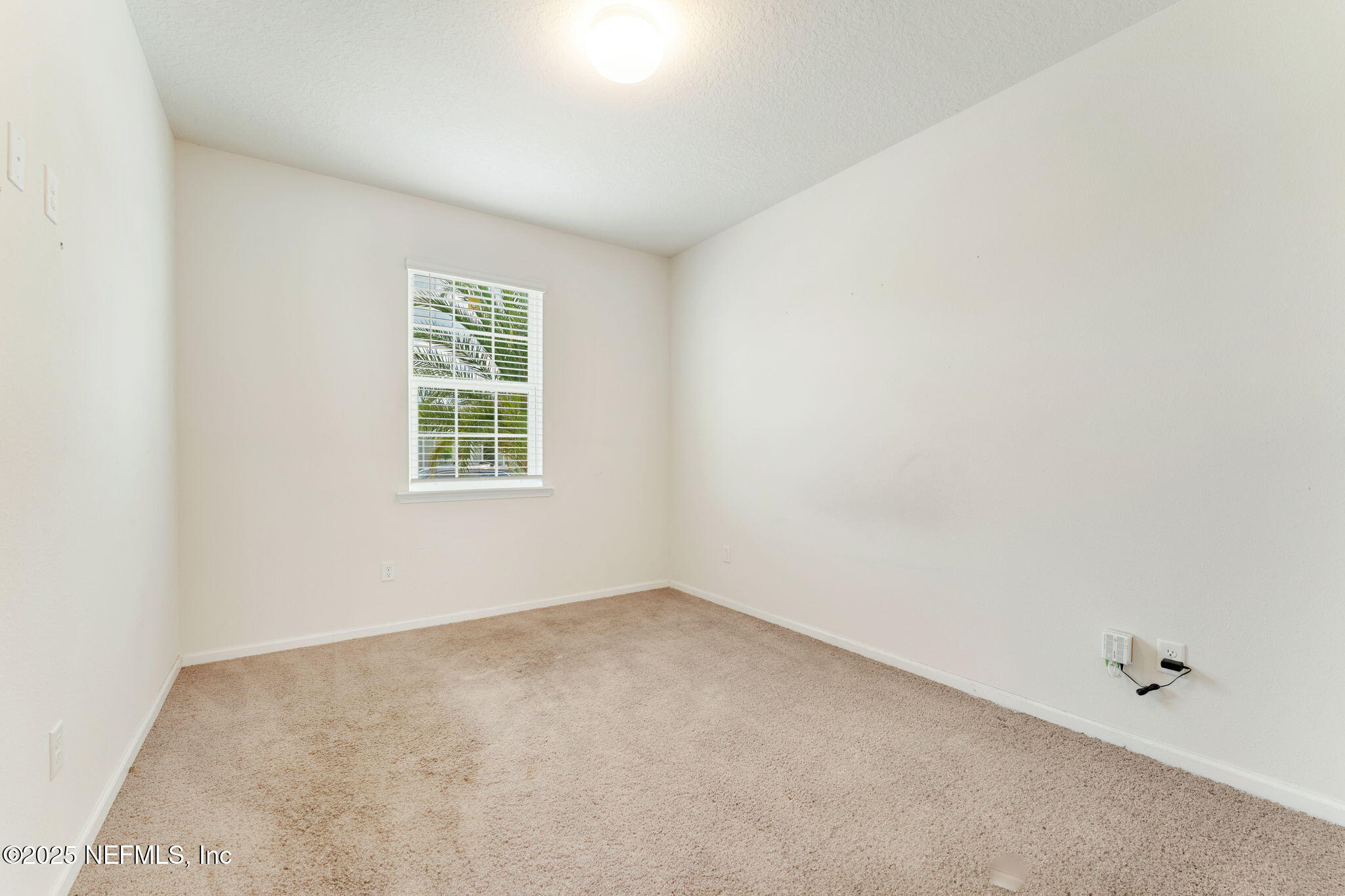 52 Opal Way St. Augustine, FL 32086 - Photo 23 of 55 an empty room with a window